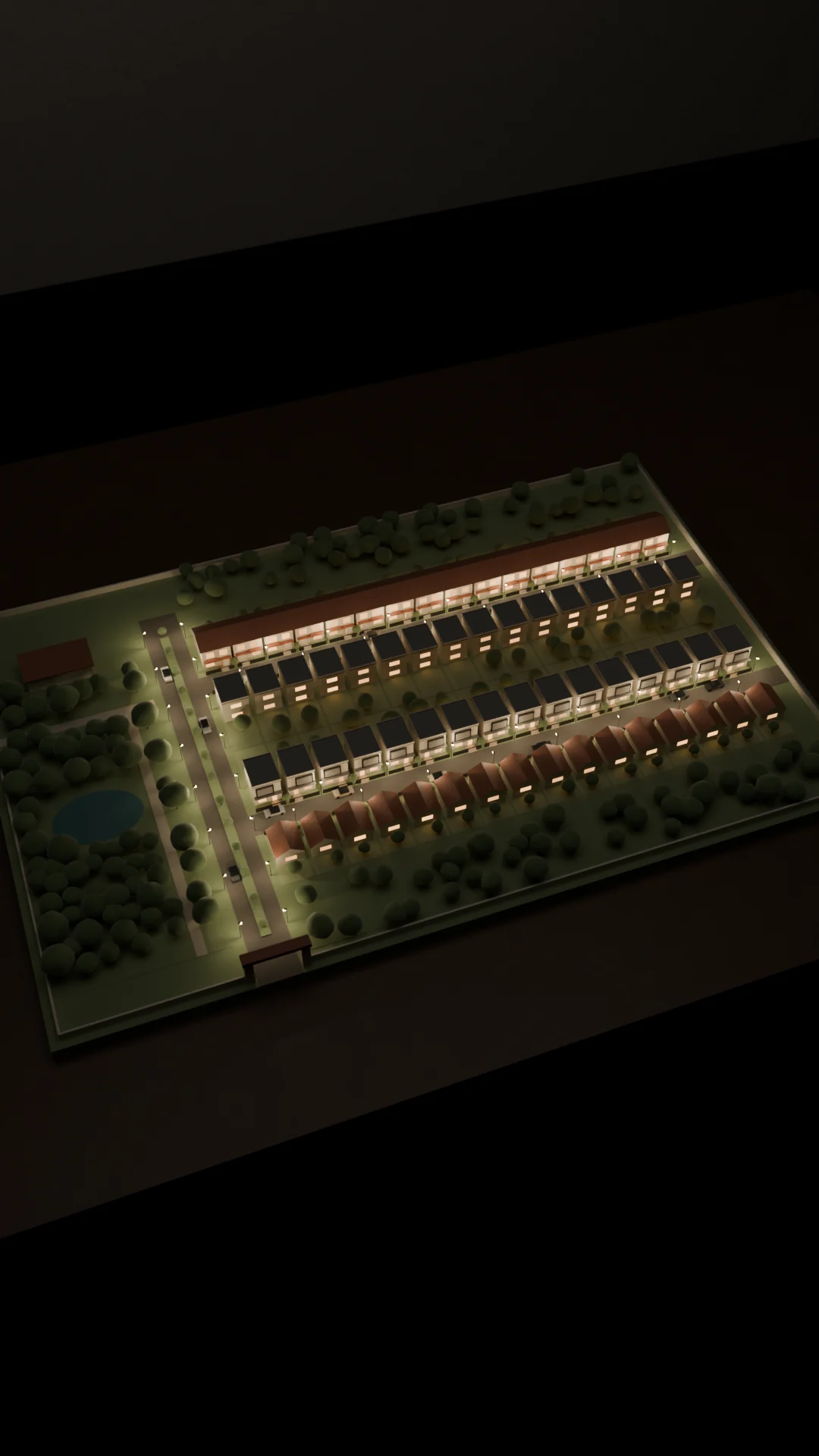 Siteplan 3D cluster Linden pada malam hari: 64 rumah dalam empat deret dengan jendela menyala, lampu jalan, taman dengan kolam, dan gerbang.